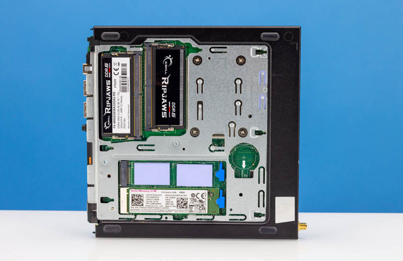 https://www.servethehome.com/wp-content/uploads/2023/04/Lenovo-ThinkCentre-M80q-Gen-3-Tiny-Bottom-M.2-SSD-Slots-and-G.Skill-64GB-Configuration-Installed-Overview.jpg