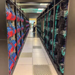 Down Aisle Of HPE Cray AMD Liquid Cooled Racks For El Capitan At LLNL 1