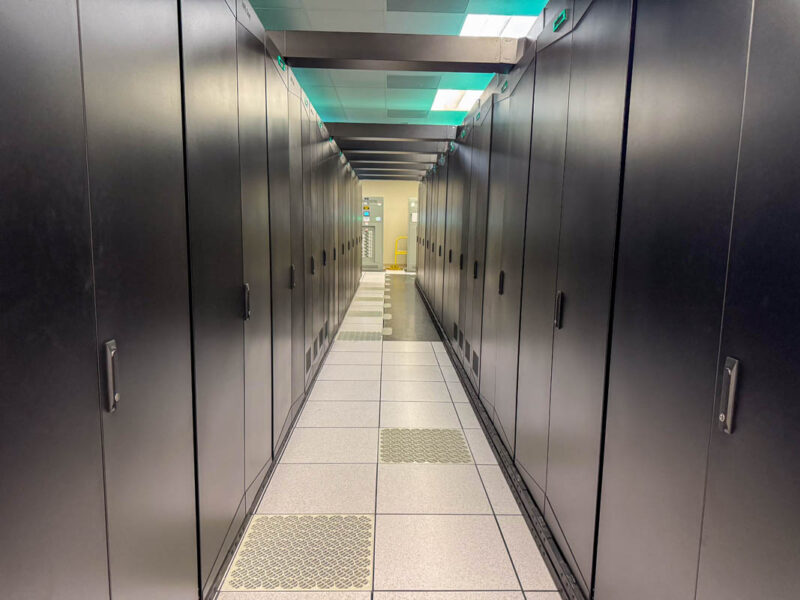 Down Closed Aisle Of HPE Cray AMD Liquid Cooled Racks For El Capitan At LLNL 1