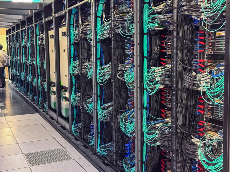 Down Networking Aisle Of HPE Cray AMD Liquid Cooled Racks For El Capitan At LLNL 1